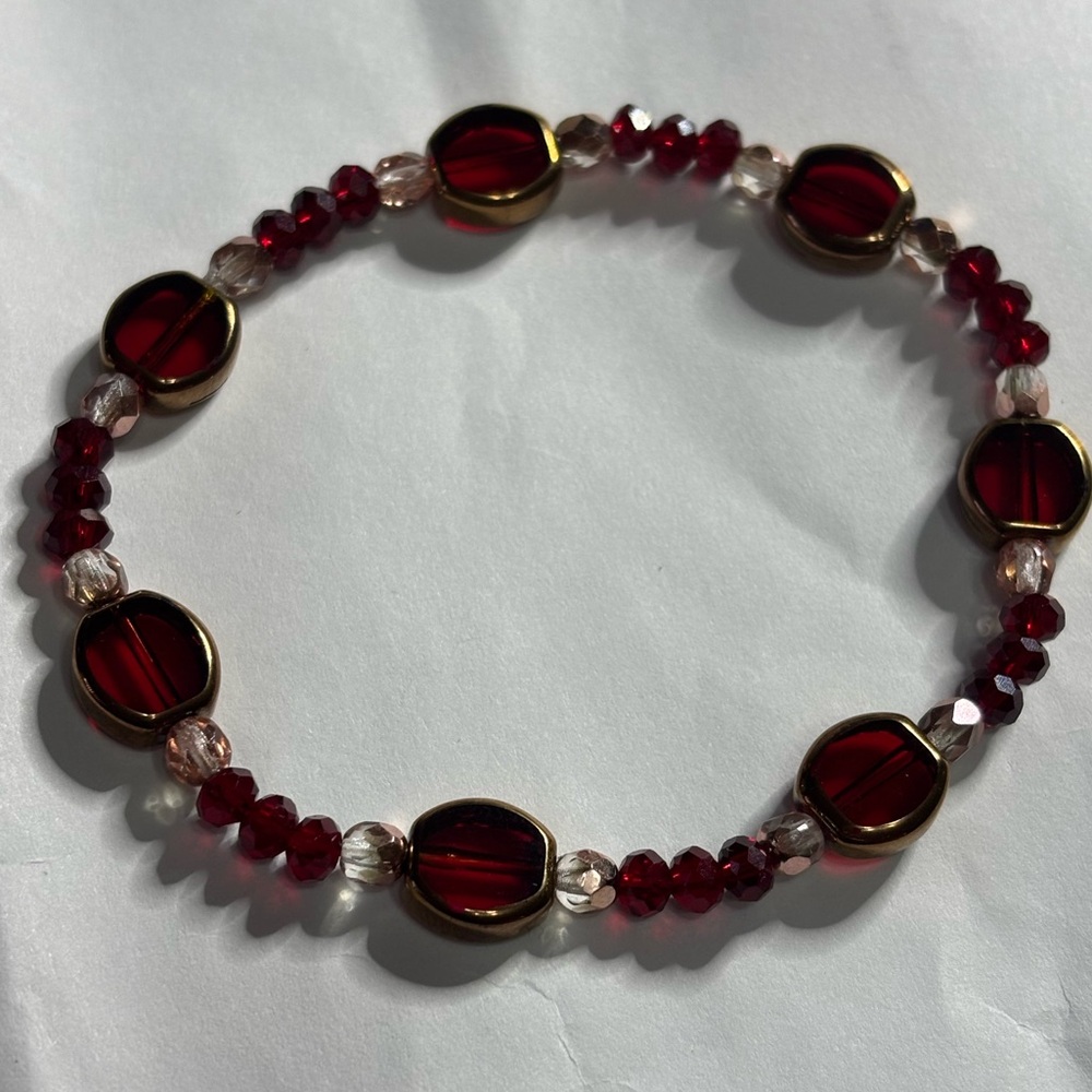 Handmade stretch bracelet gold tone lined red glass and red and rose gold Czech